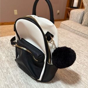 Black and White Backpack with Pom Pom